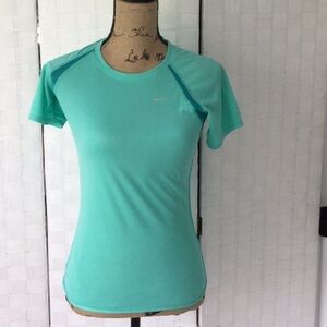 Woman’s Dri-Fit pullover shirt size XS color green short sleeves washable.  #433